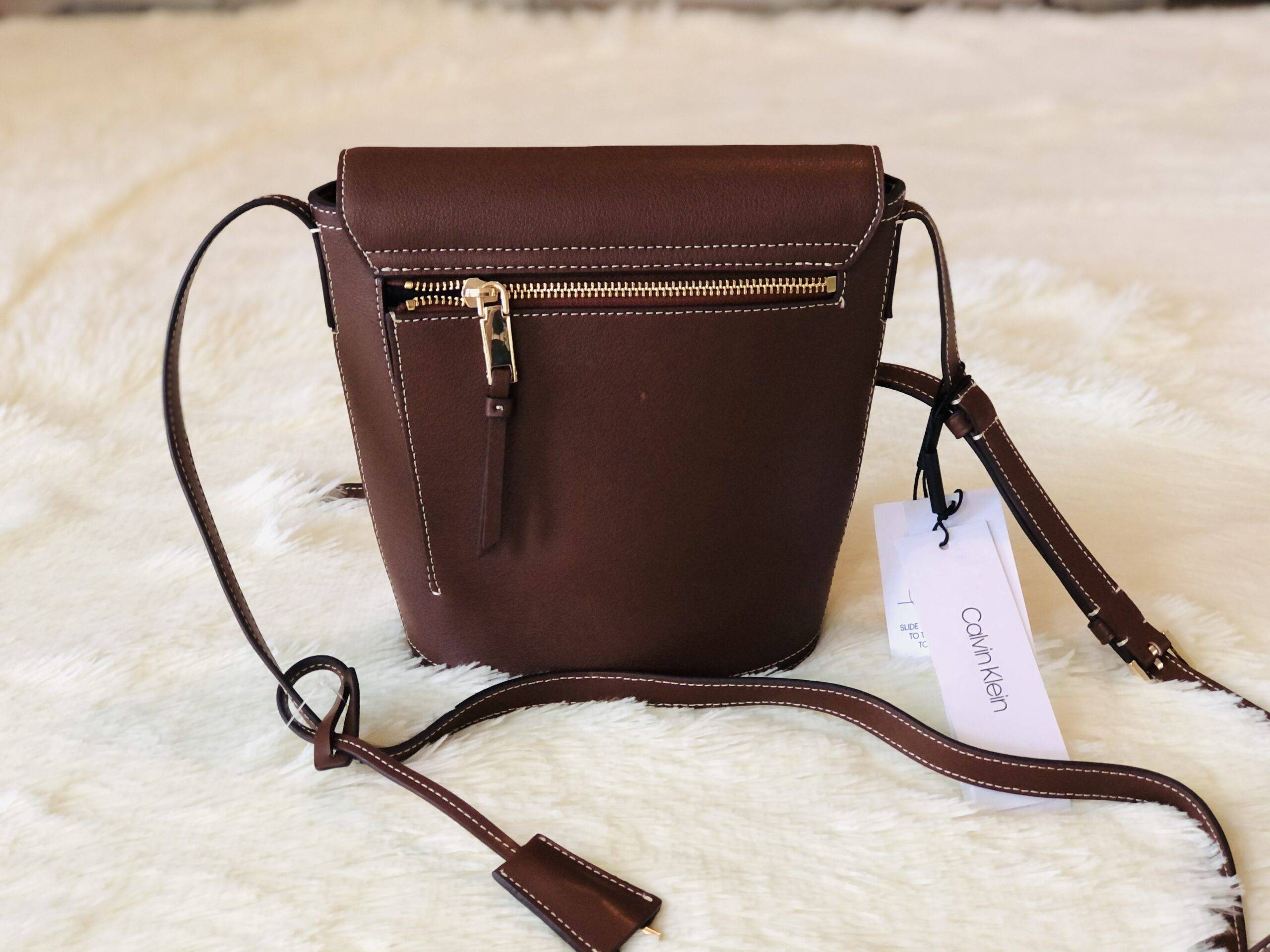 Calvin Klein subtle contrast stitching mixes with bold designer hardware bucket bag Branded Bags Bucket cb5feb1b7314637725a2e7: Black|Brown